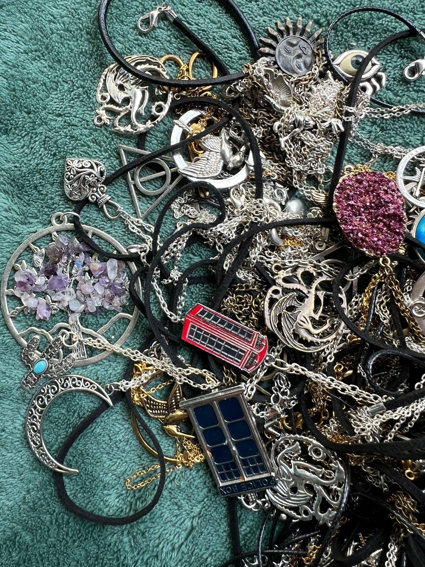 Job Lot of Tangled Up Necklaces.