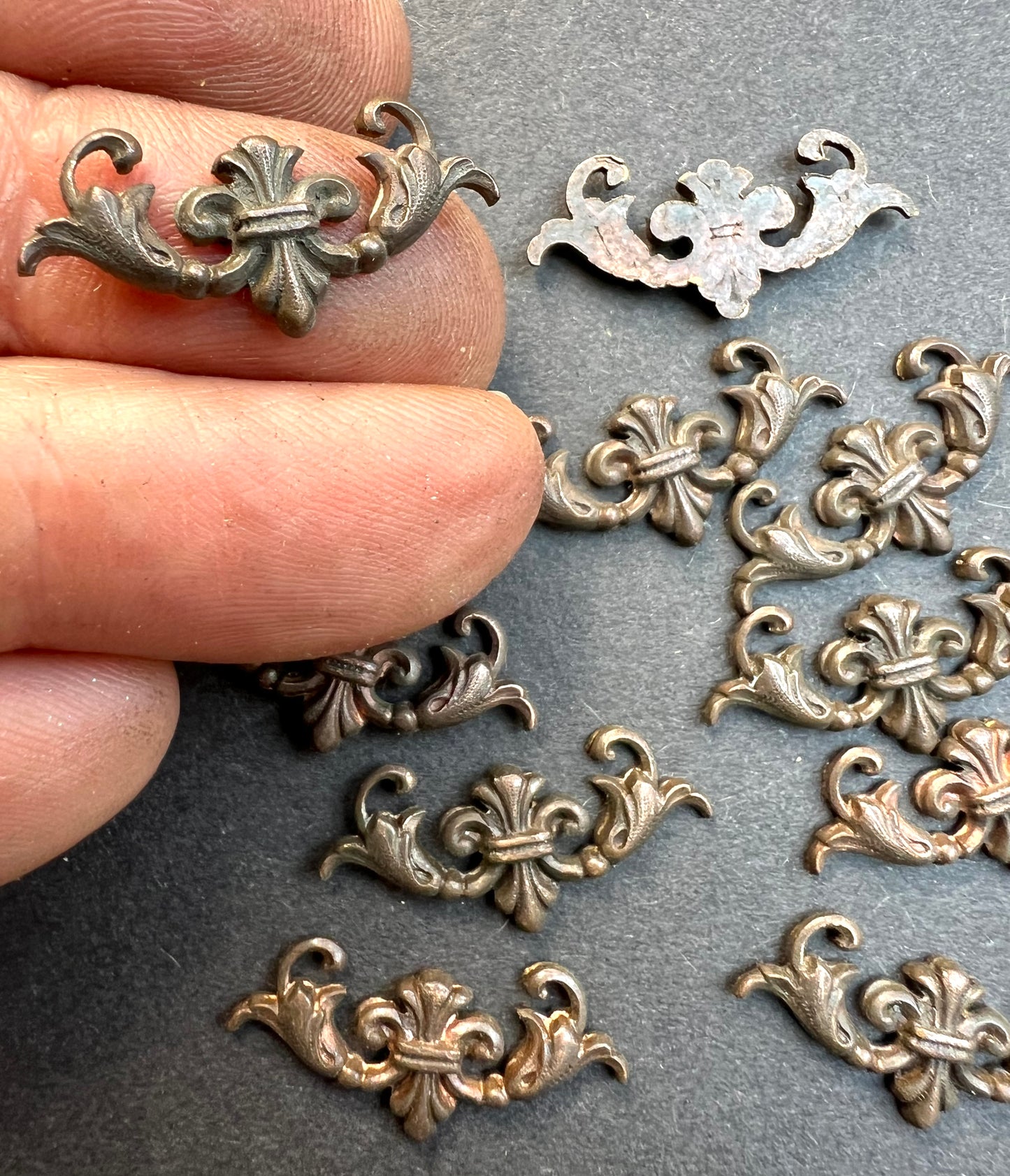 10 Early 20th Century French Decorative Brass Stampings - 2.5cm long.