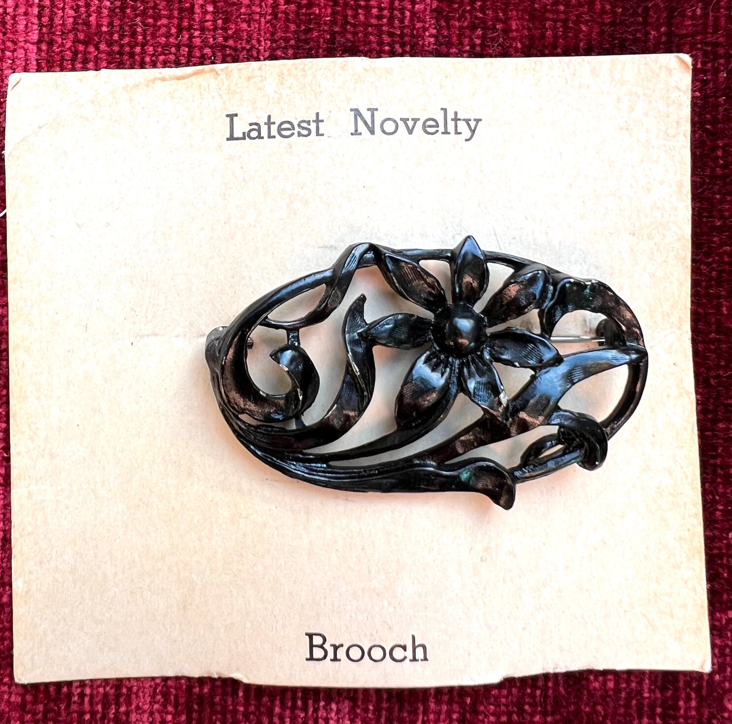 Confident 1940s Black Metal Floral Brooch  - Oval