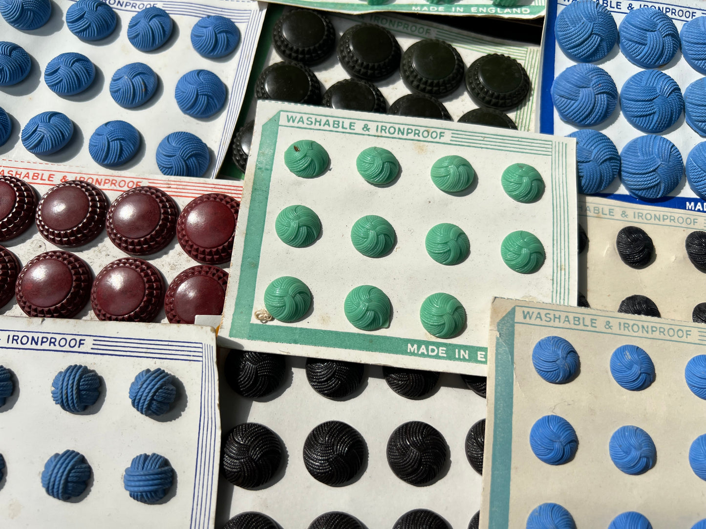 15 Sheets of Colourful 1940s Made in England Bakelite and Catalin Buttons