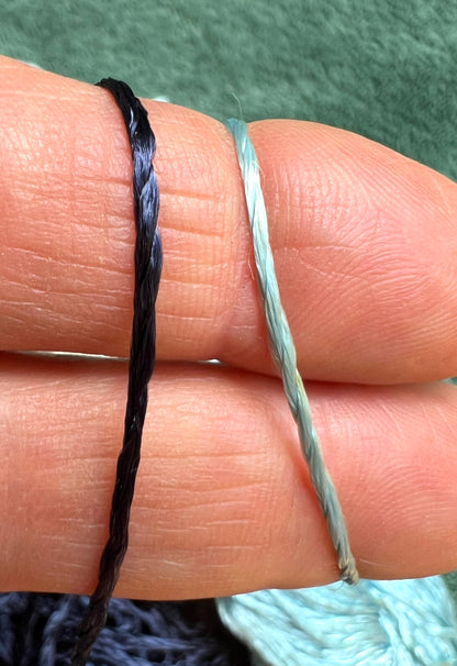 2 Skeins of Vintage Silvery Blue + Navy Blue 1/2mm Silky Rayon Thread -with Some Discolouration.