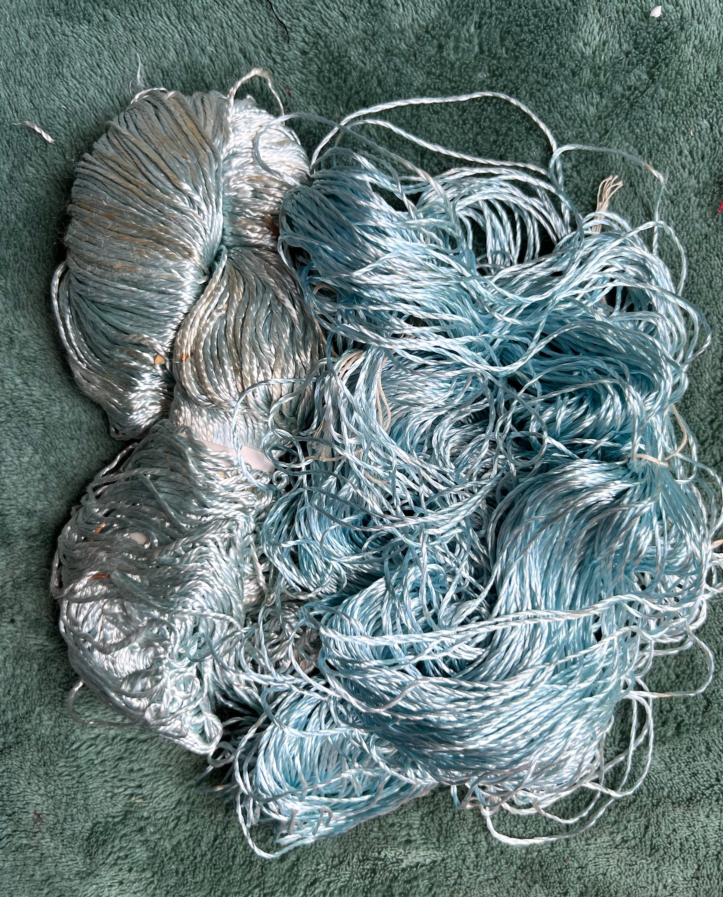 2 Skeins of Vintage Silvery Light + Darker Blue  1/2mm Silky Rayon Thread -with Some Discolouration.