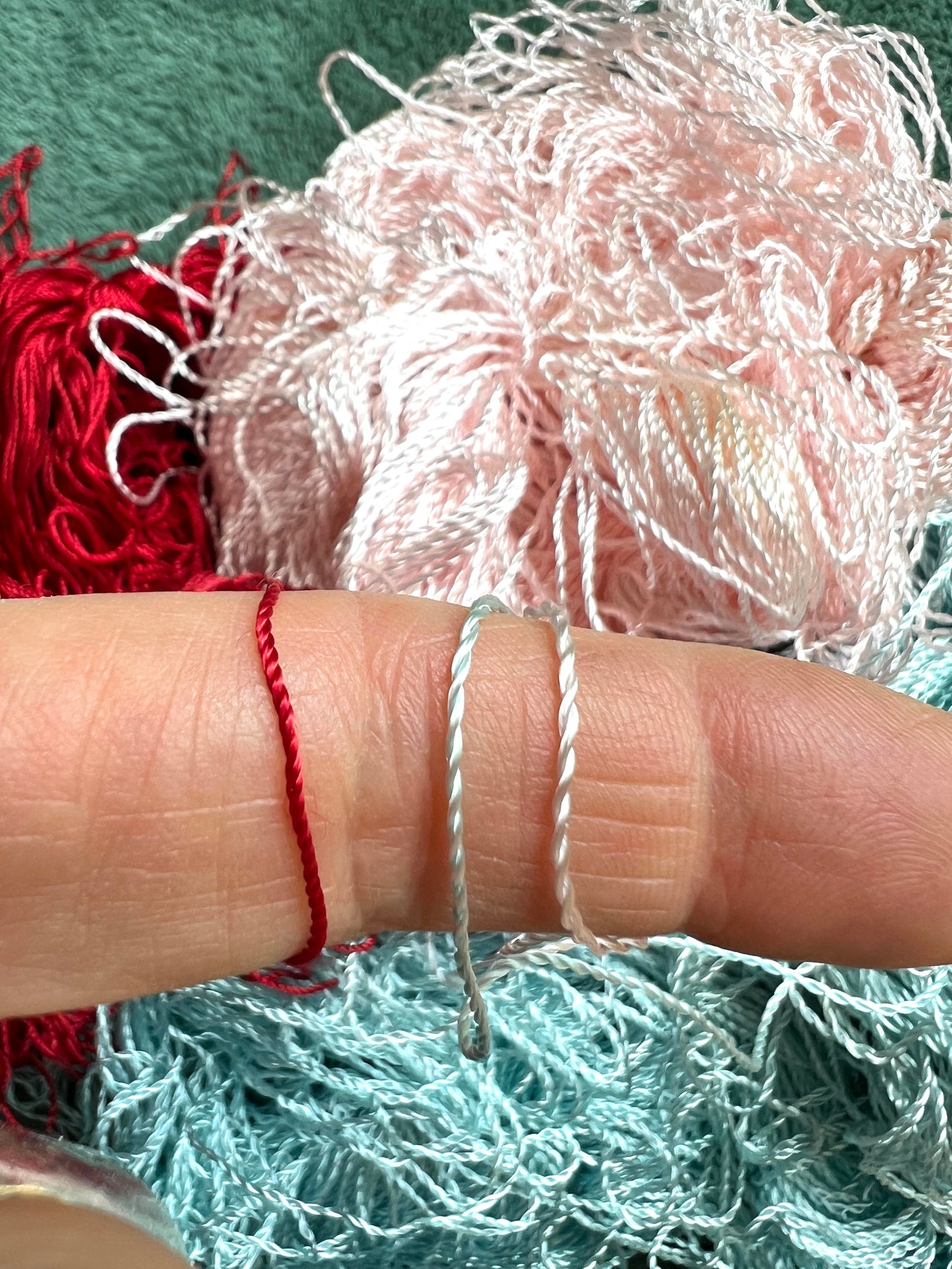 3 Skeins of Vintage Silvery Pink , Dark Red + Sky Blue 1/2mm Silky Rayon Thread -Unwound and with Some Discolouration.