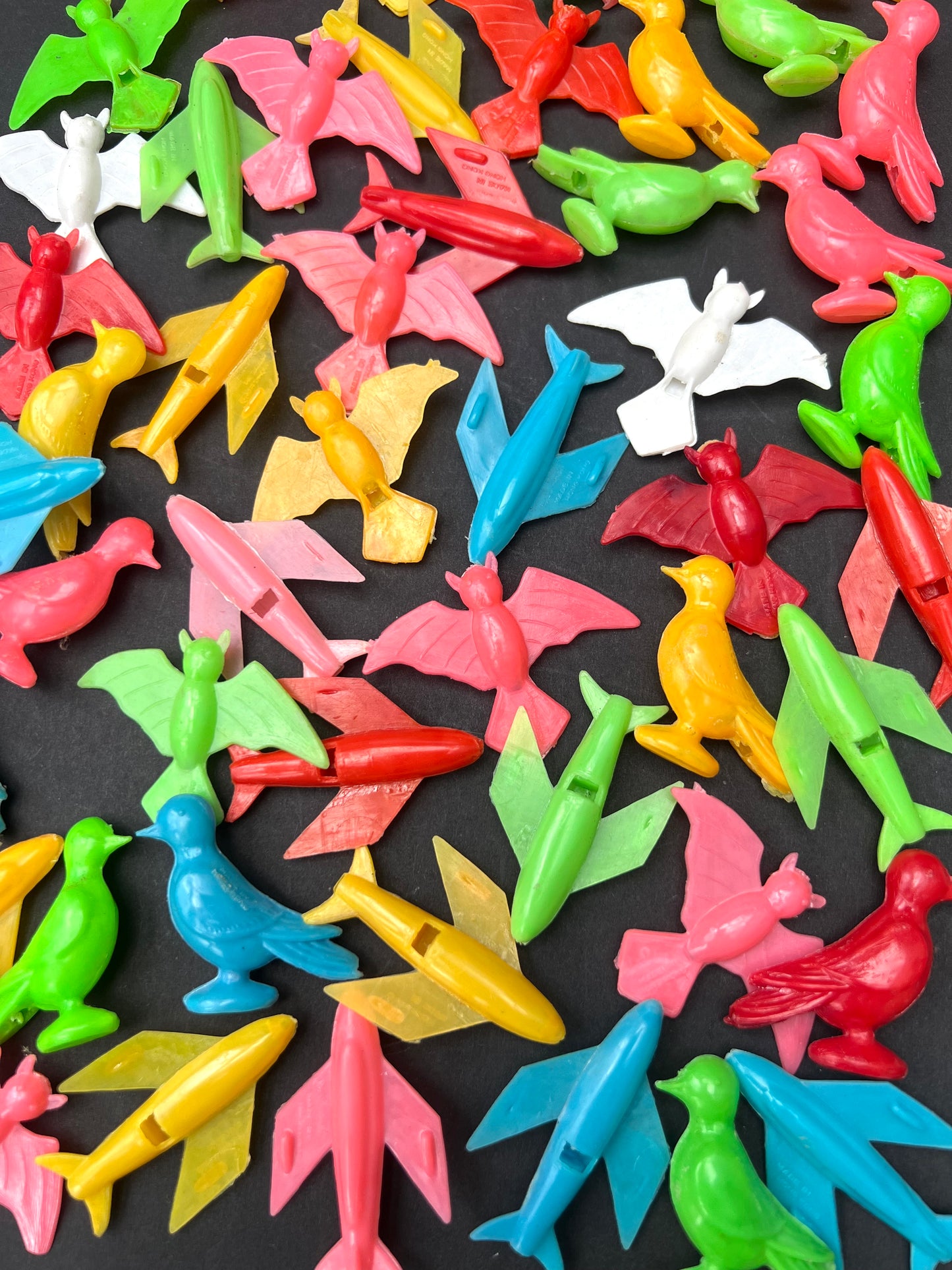 50 Plastic 5cm Birds, Bats and Planes Whistles Made in Hong Kong