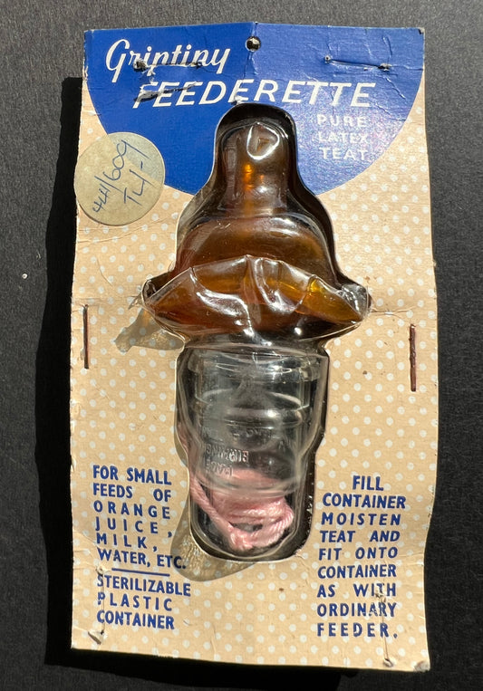 Packaged Latex Teat and Tiny Feeder Bottle.