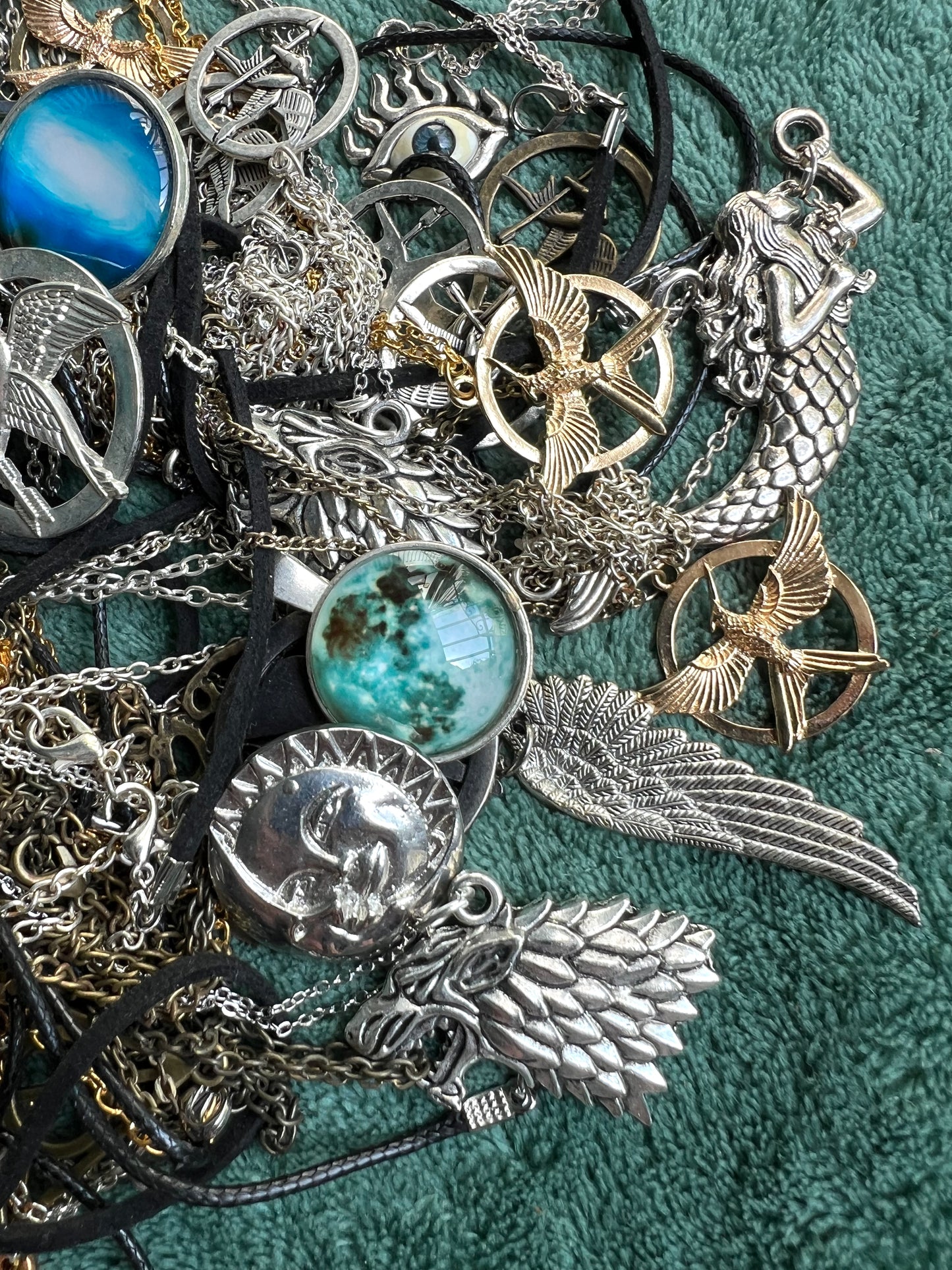Job Lot of Tangled Up Necklaces.