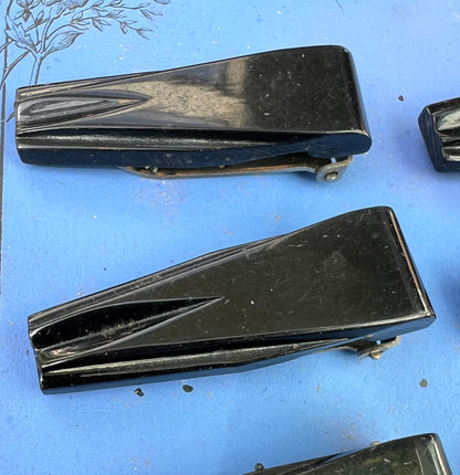 1930s Display Card of 12 Wonderfully Deco Black Bakelite Dress Clips