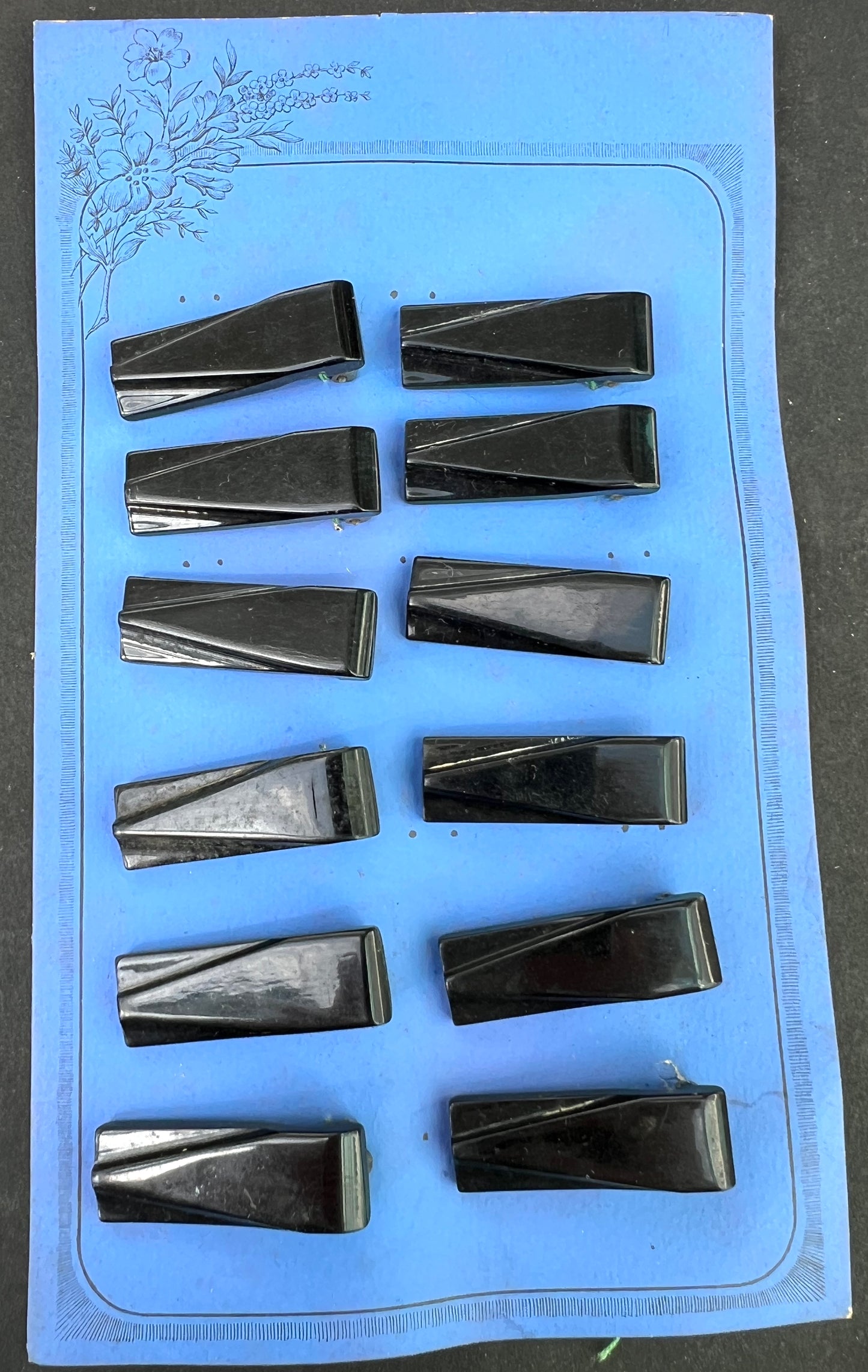 1930s Display Card of 12 Streamlined Black Bakelite Dress Clips