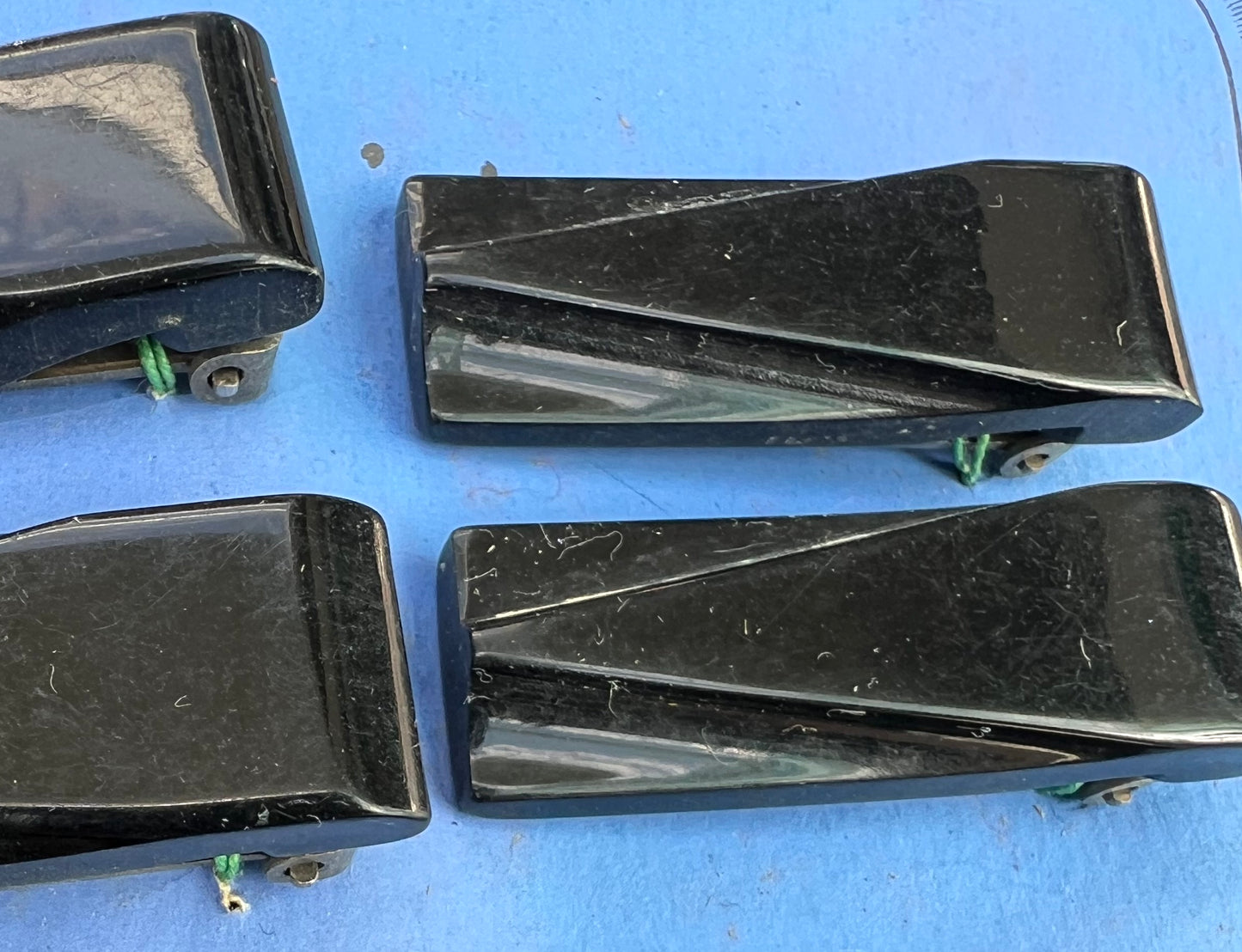 1930s Display Card of 12 Streamlined Black Bakelite Dress Clips