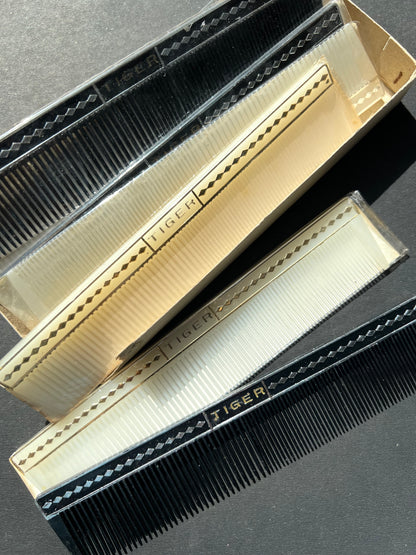 A Box of 12 Mid Century TIGER Combs. Made in Japan.