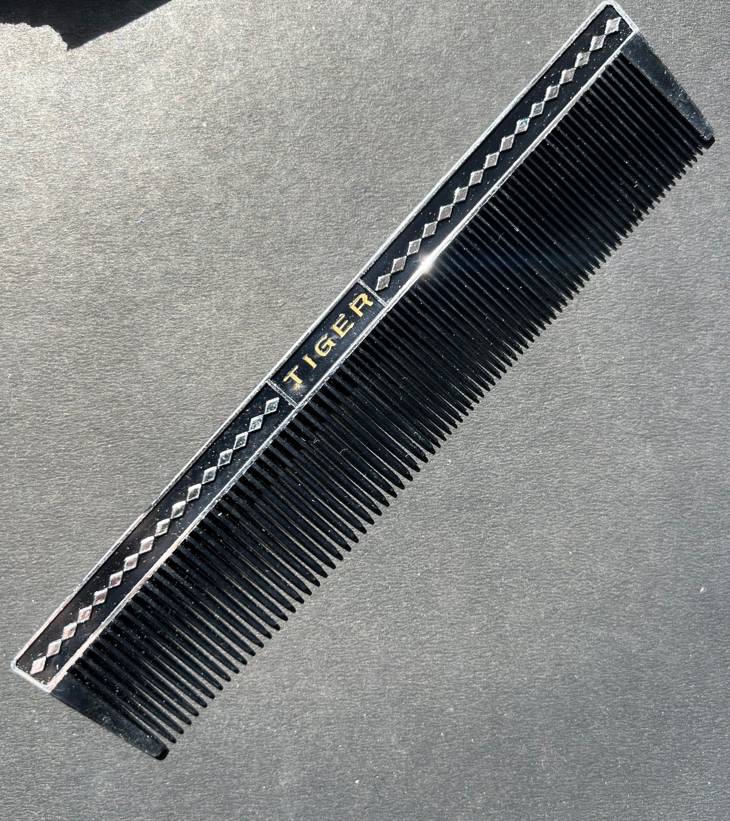 A Box of 12 Mid Century TIGER Combs. Made in Japan.