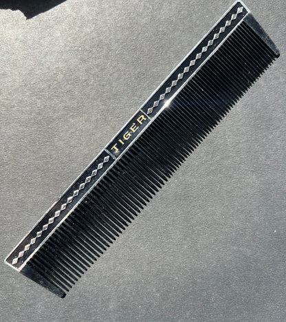 A Box of 12 Mid Century TIGER Combs. Made in Japan.