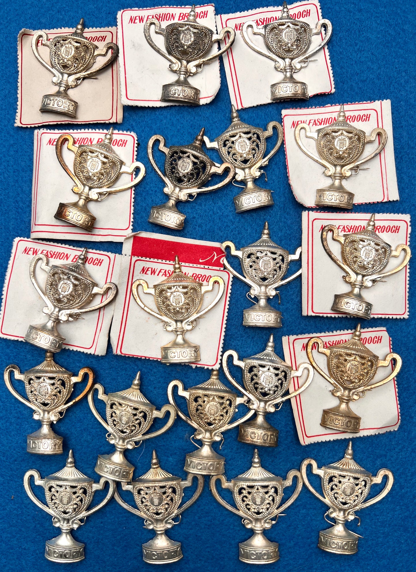12 Tarnished "VICTORY" Trophy Brooches