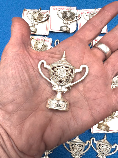 12 Tarnished "VICTORY" Trophy Brooches