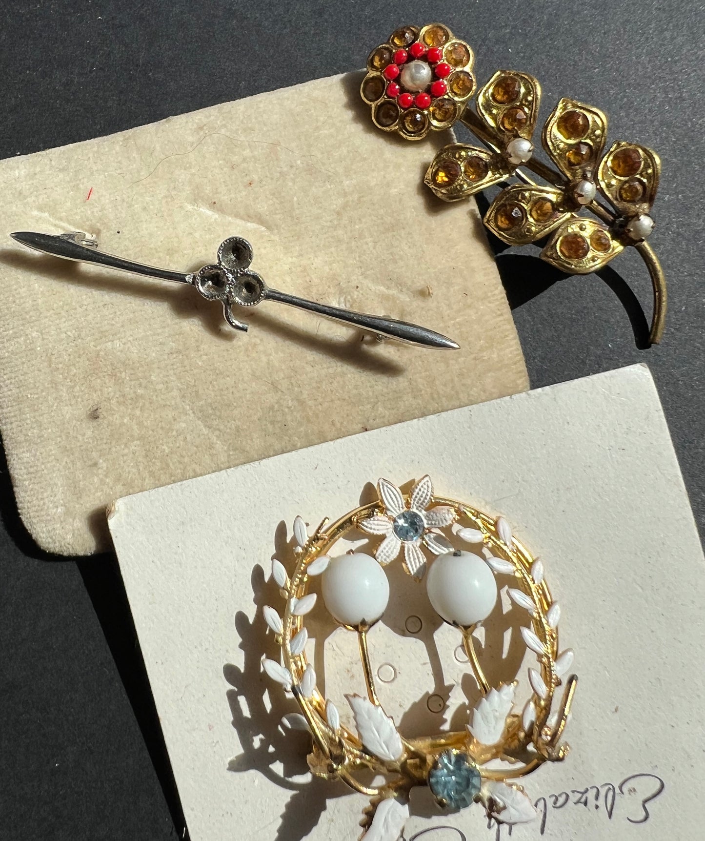 7 Vintage Brooches with the odd stone missing