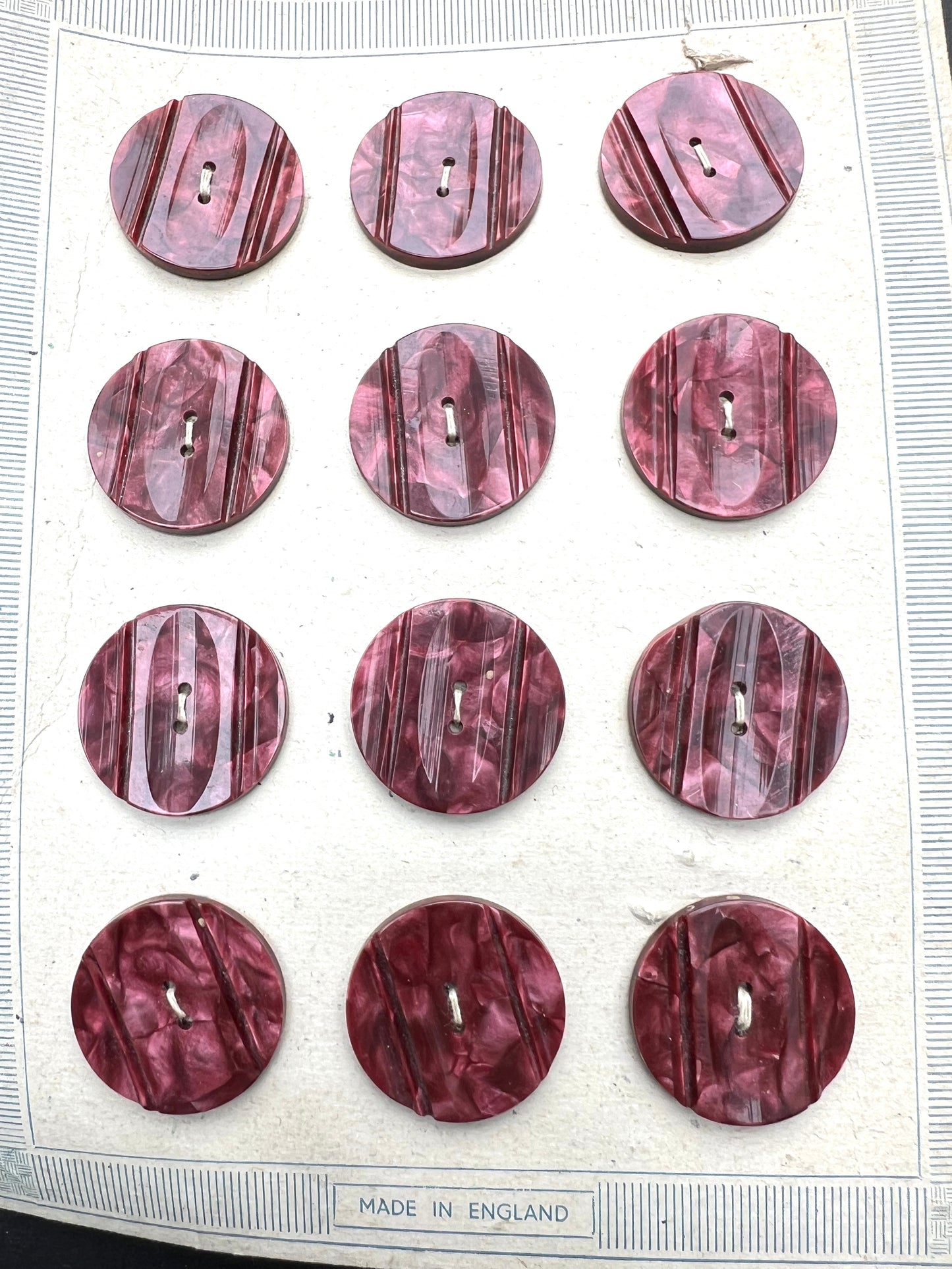 Sheet of 12 Vintage 2.6cm Marbled Plum Lucite Buttons.