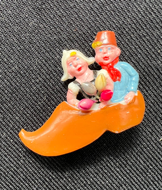 Sweet Vintage Celluloid Brooch ..Dutch Children in a Clog.
