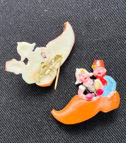 Sweet Vintage Celluloid Brooch ..Dutch Children in a Clog.