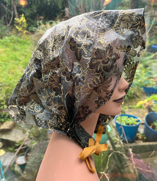 Impressively Dramatic 1950s Black and Gold Rain Hat