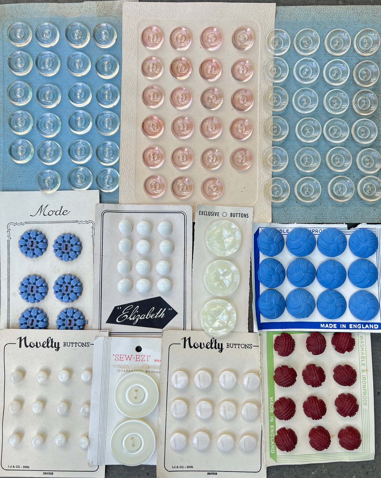 11 Sheets of Vintage Glass, Lucite and Bakelite Buttons (L)