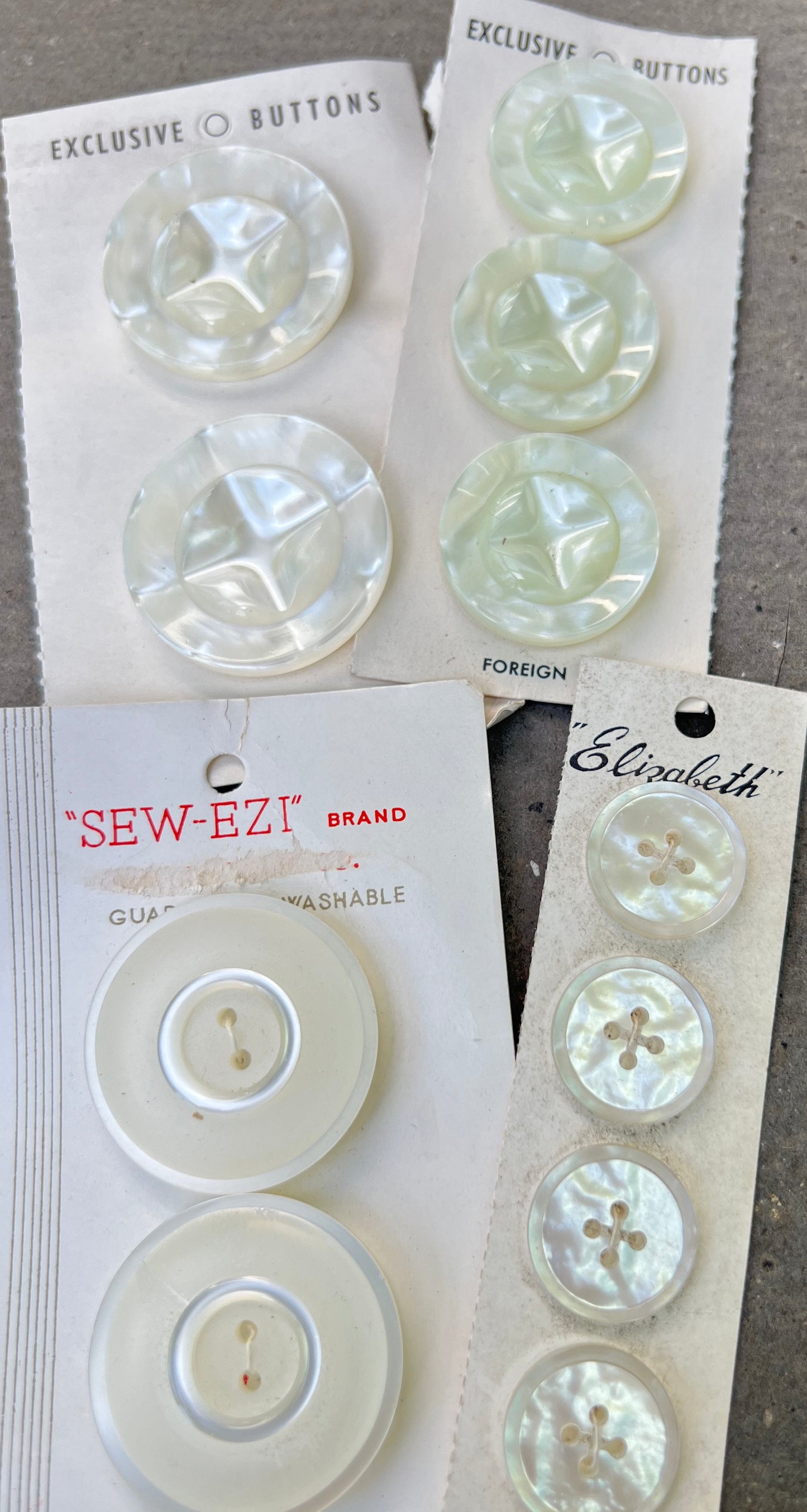 9 Sheets of Vintage Glass and Lucite White and Cream Buttons (N)