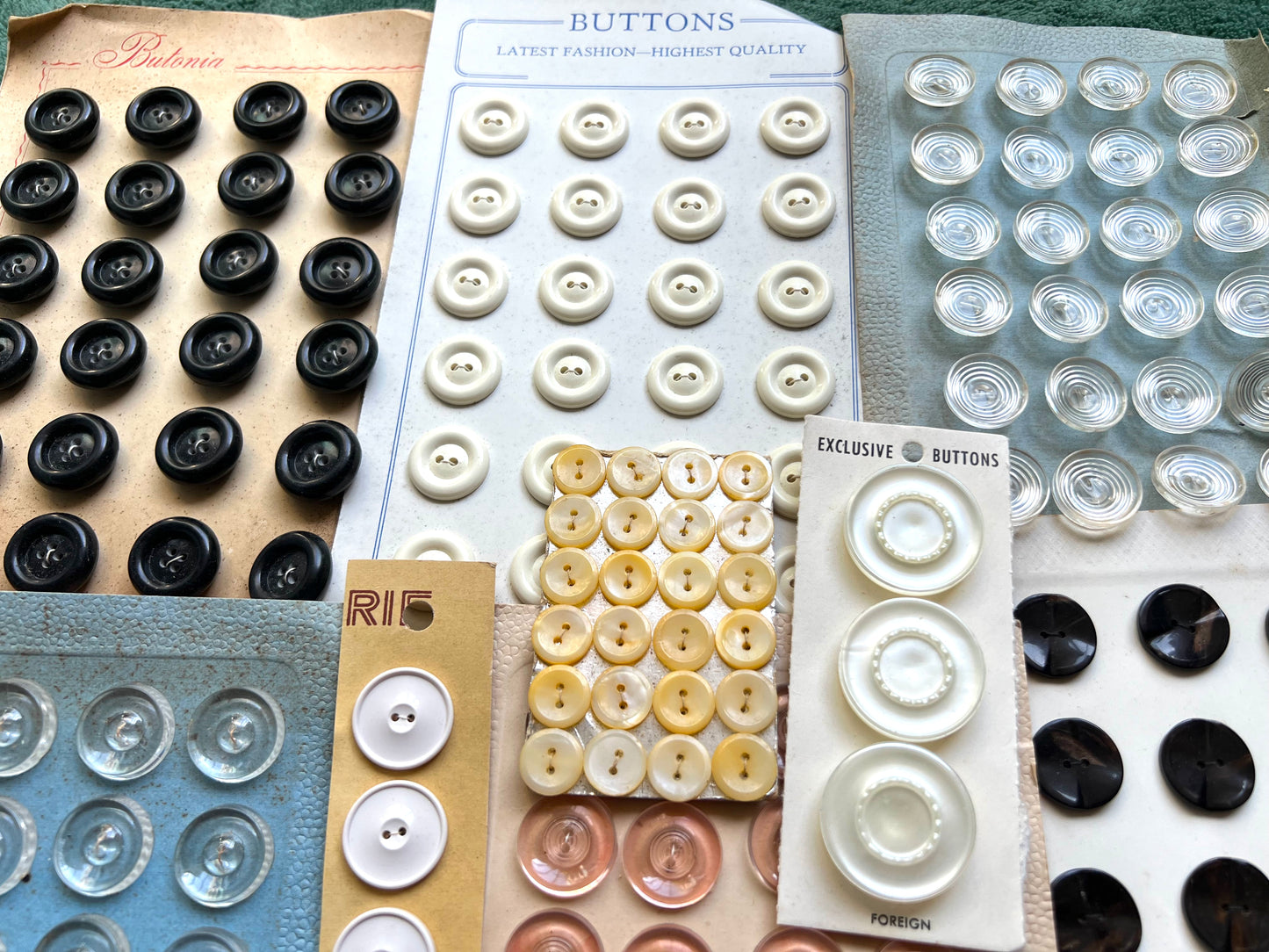 15 Sheets of Assorted Coloured Vintage Glass, Bakelite and Lucite Buttons (U)