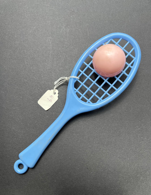 A Vintage Rattle that is a Tennis Racquet and Ball