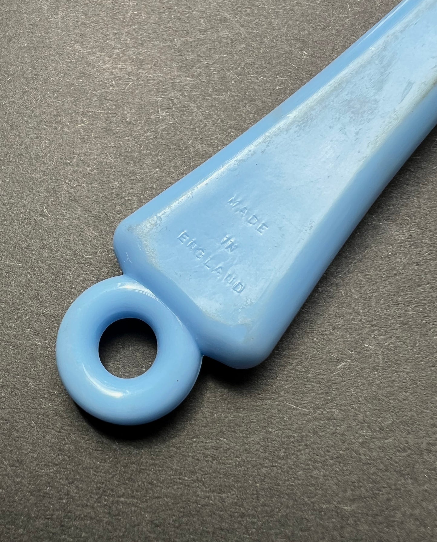 A Vintage Rattle that is a Tennis Racquet and Ball