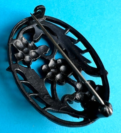 Confident 1940s Black Metal Floral Brooch  - Oval
