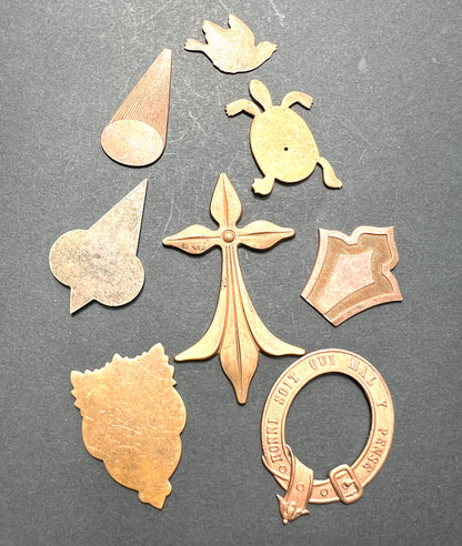 8 Vintage French Brass Stampings  in Assorted Shapes.