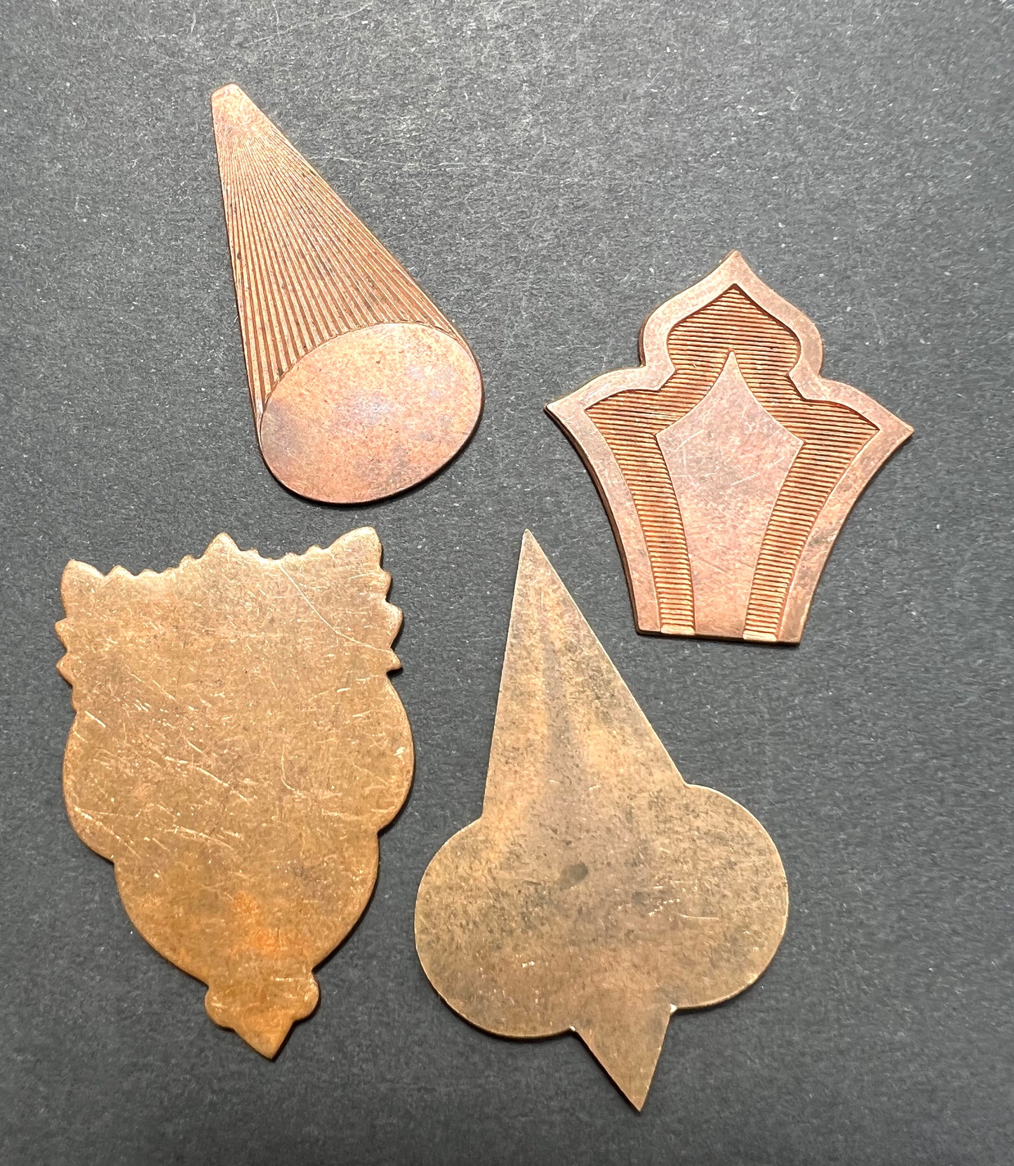 8 Vintage French Brass Stampings  in Assorted Shapes.
