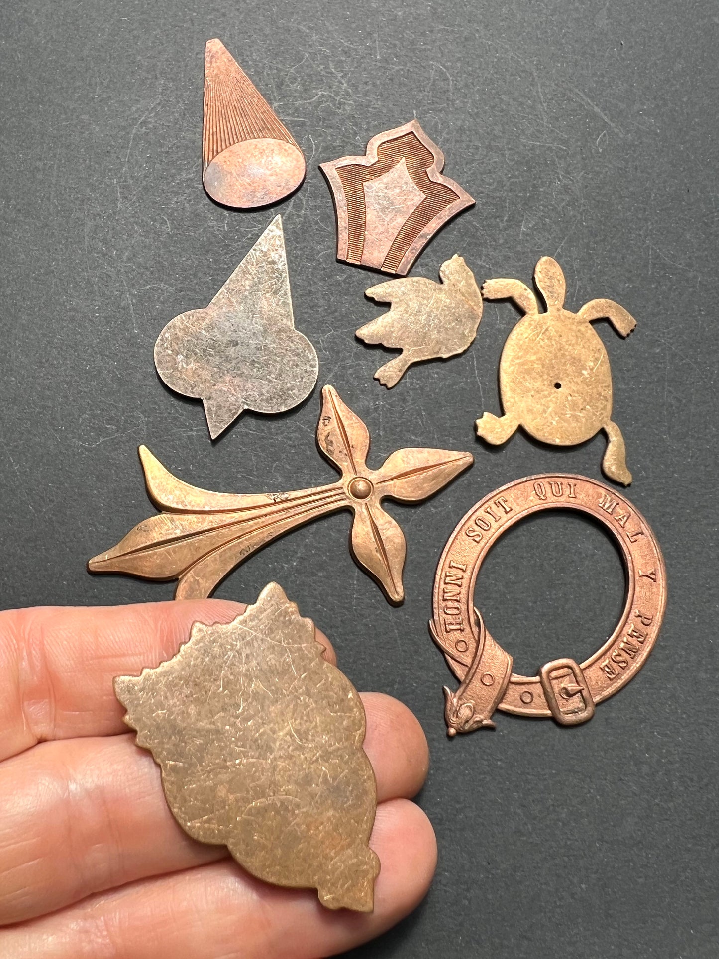 8 Vintage French Brass Stampings  in Assorted Shapes.