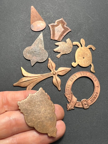 8 Vintage French Brass Stampings  in Assorted Shapes.