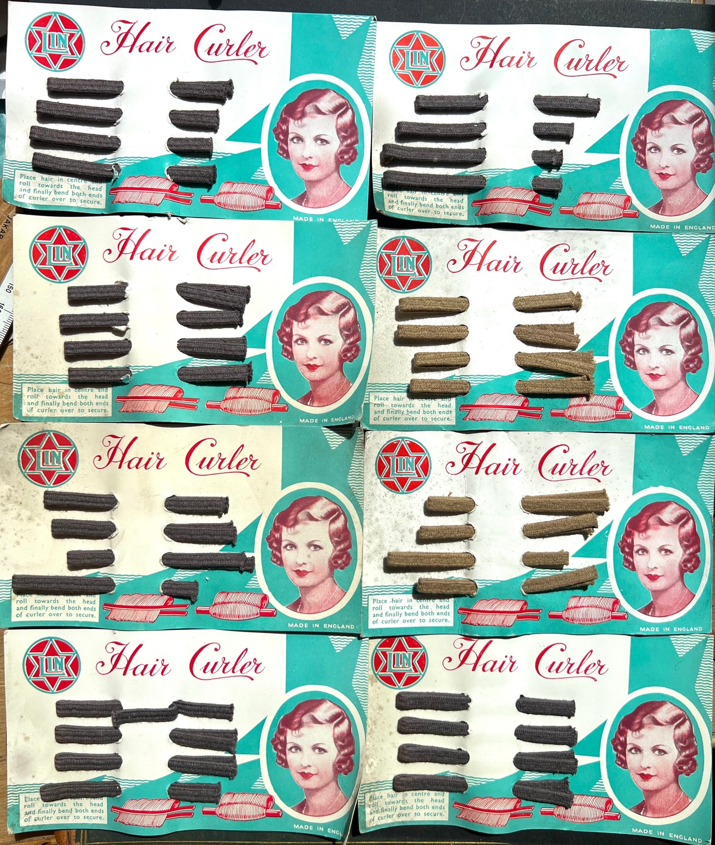 8 Cards of 1930s  Flexible Fabric Covered Hair Curlers - All Slightly Foxed