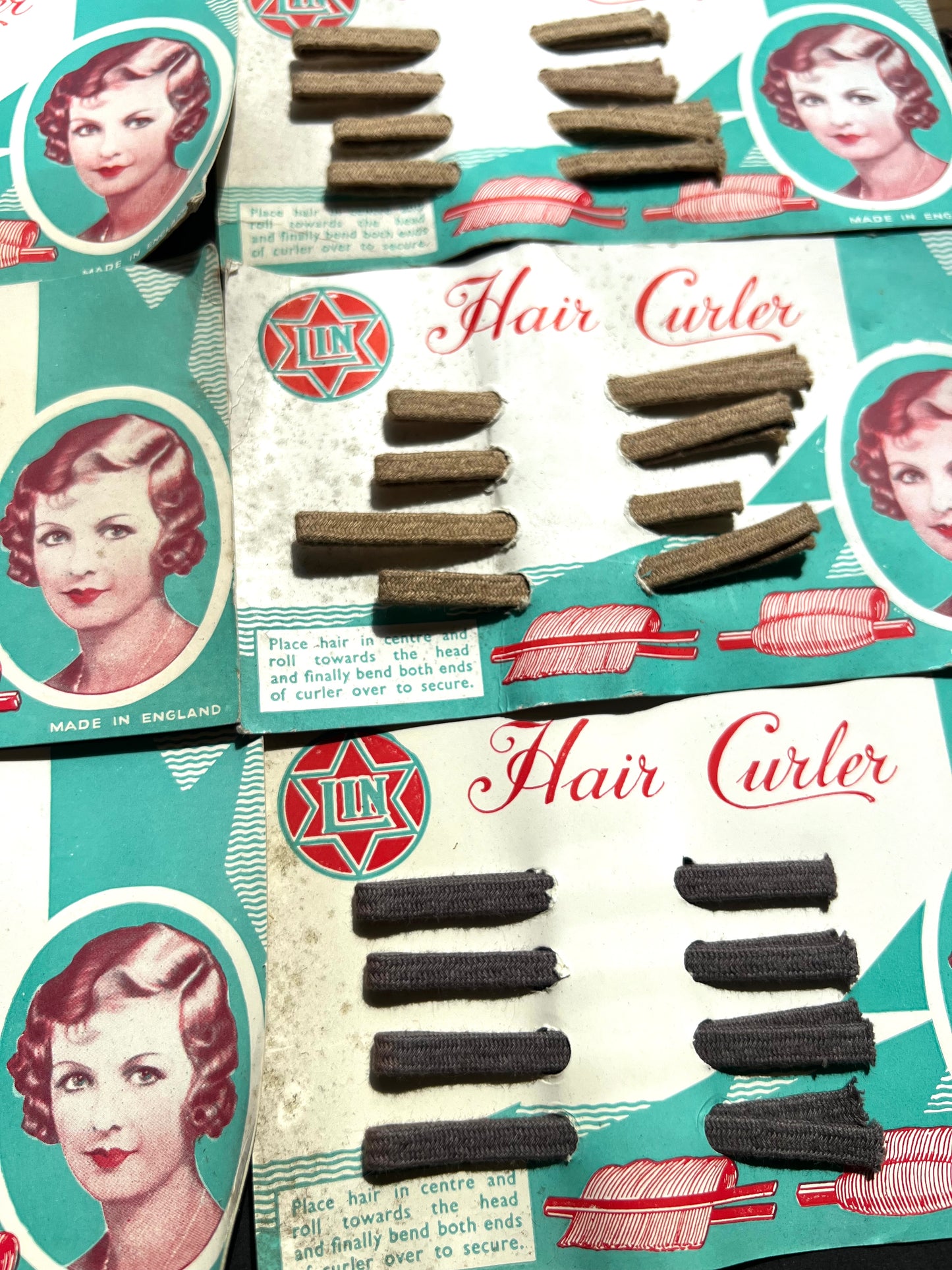 8 Cards of 1930s  Flexible Fabric Covered Hair Curlers - All Slightly Foxed