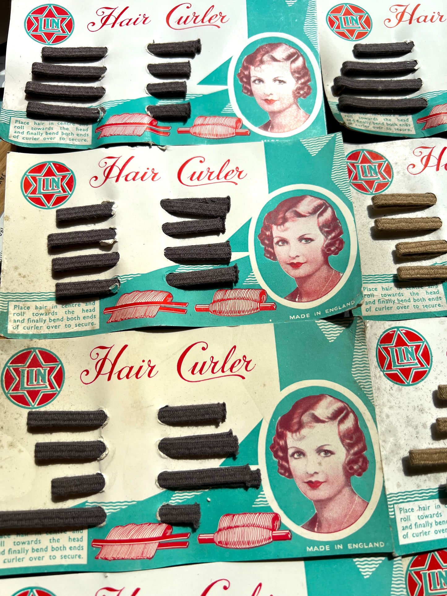 8 Cards of 1930s  Flexible Fabric Covered Hair Curlers - All Slightly Foxed