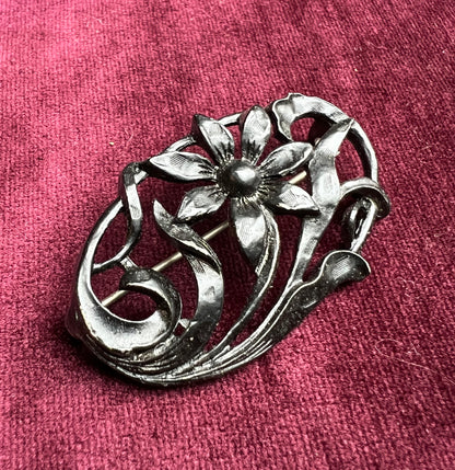 Confident 1940s Black Metal Floral Brooch  - Oval