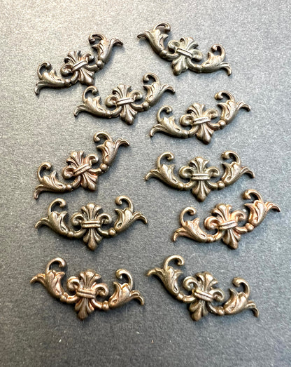 10 Early 20th Century French Decorative Brass Stampings - 2.5cm long.