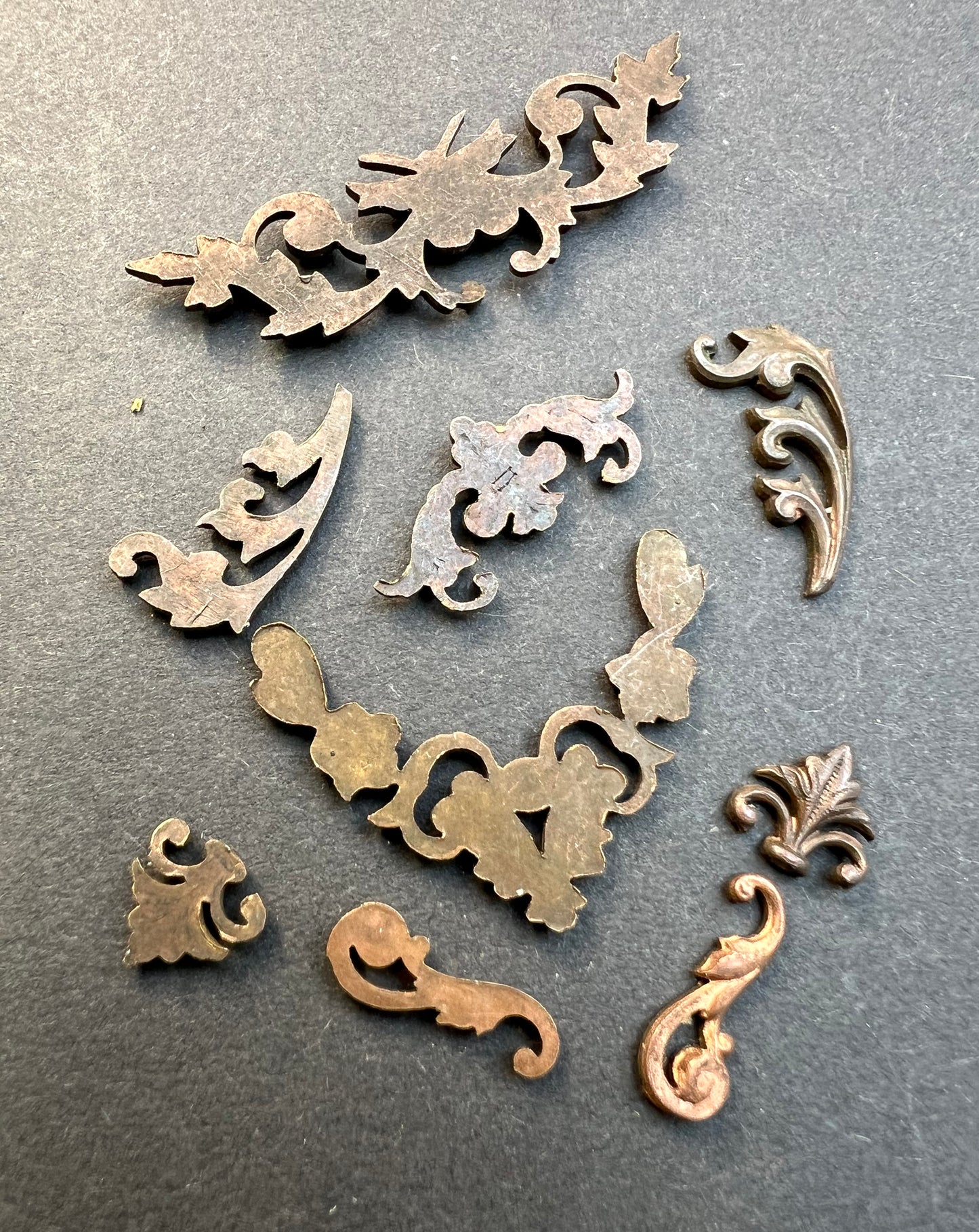 9 Early 20th Century French Decorative Brass Stampings - Assorted Styles