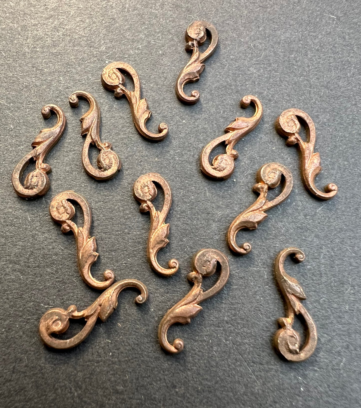 12 Tiny Early 20th Century French Brass Flourishes - 1.5cm Stampings