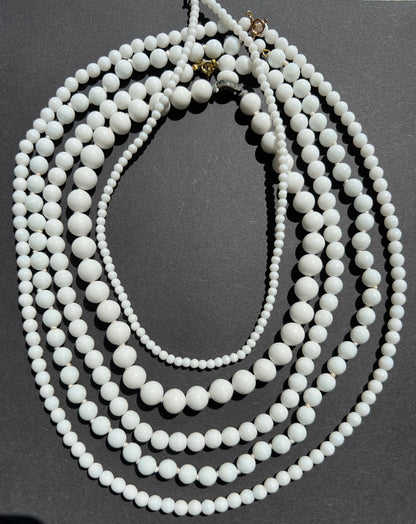 9 Varied Vintage White Glass Bead Necklaces