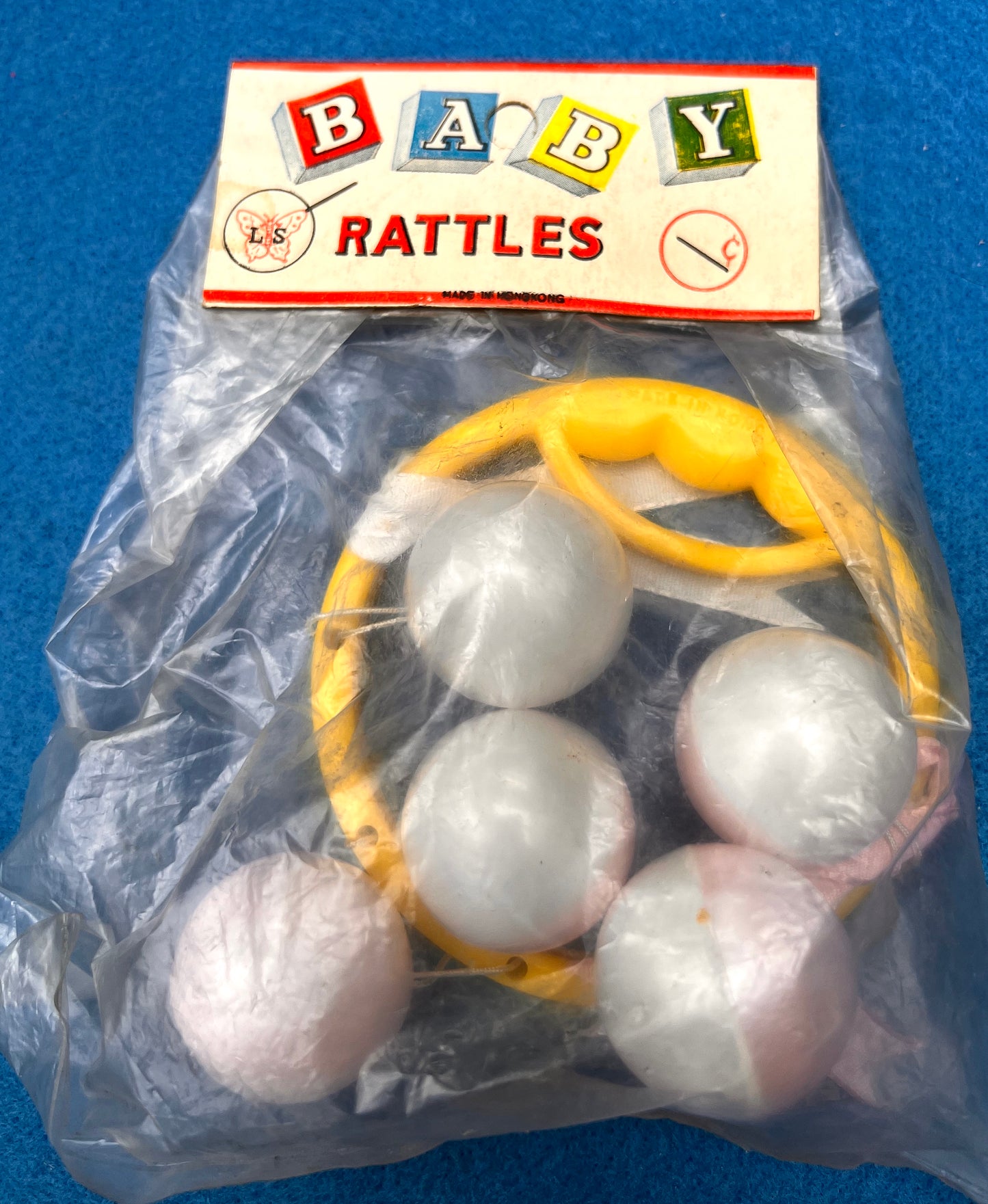 Vintage Balls on Strings Rattle - Made in Hong Kong