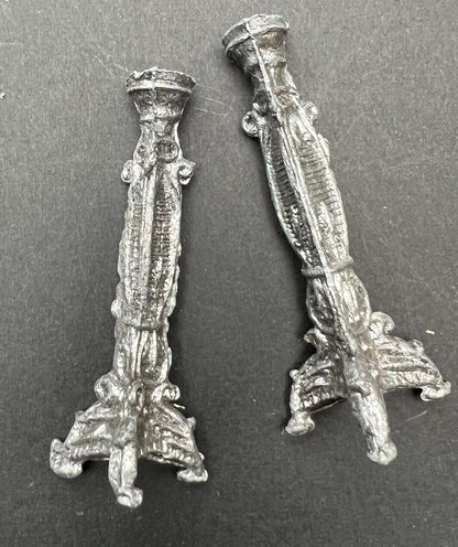 A Pair of Mysterious Small Candlesticks