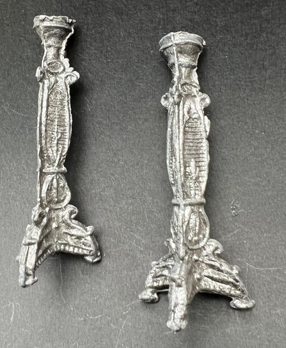A Pair of Mysterious Small Candlesticks
