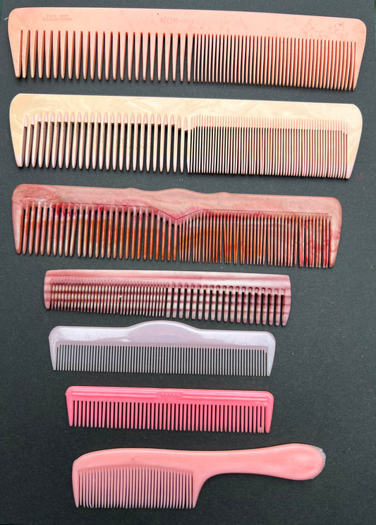 7 1920s to 1960s Unused Pink Combs