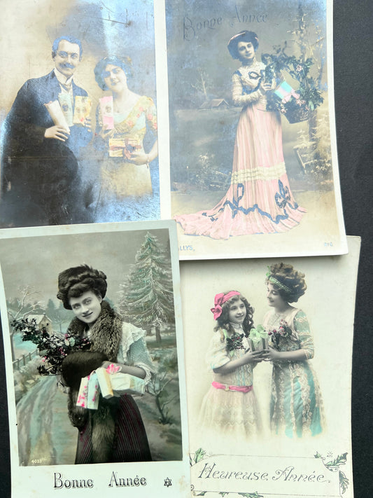 4 Edwardian French Postcards Laden with Christmas Presents..