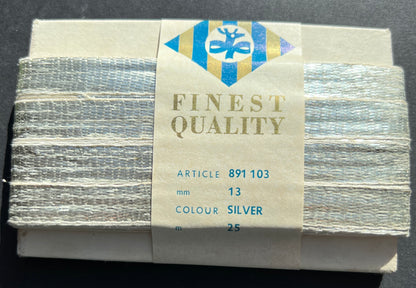 25m of 1.3cm or 8mm wide Shiny Vintage Silver Metal Ribbon 25m long. Made in Czechoslovakia.