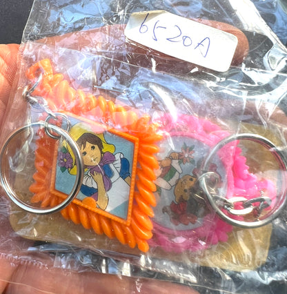2 Cute Girls in Ornate Frames Keyrings - Vintage Hong Kong Salesman's Sample