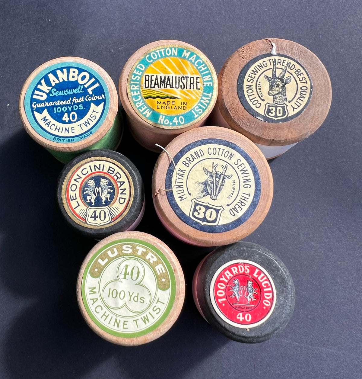 7 Old Wooden Cotton Reels with Good Labels