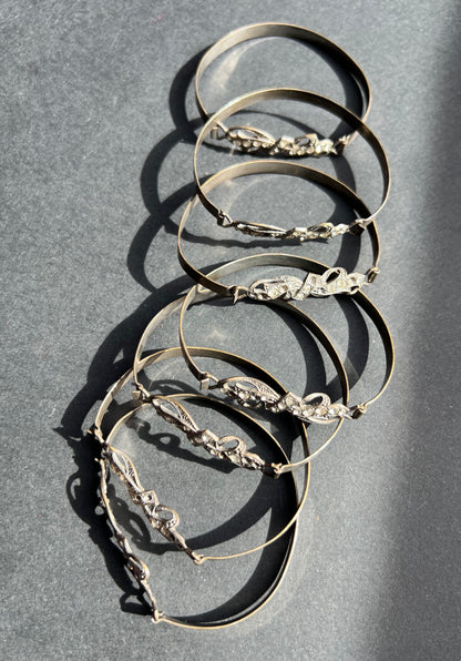 7  1930s Bangles that Need Some Crystals Replacing